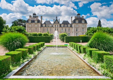photo of the beautiful Château de Cheverny from apprentice's garden in France.