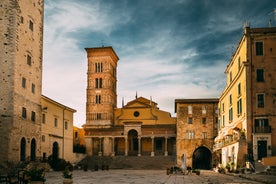 Photo of Umbrellas and sunbeds in San Felice Circeo, Italy.