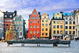 Photo of landscape with mountains, river and buildings in Lillehammer town, Norway.