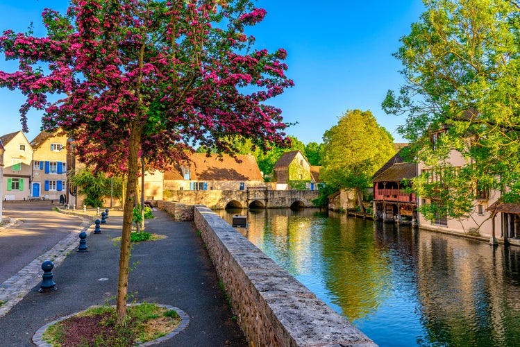 Eure River embankment with old houses in a small town Chartres, France