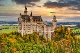 Photo of aerial panoramic view of Hohes Schloss Fussen or Gothic High Castle of the Bishops and St. Mang Abbey monastery in Fussen, Germany.