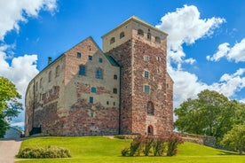 Early autumn morning panorama of the Port of Turku, Finland, with Turku Castle at background.