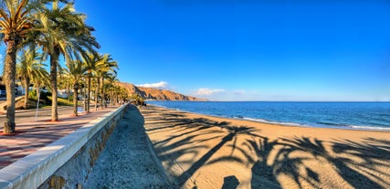 Photo of panoramic aerial view of Malaga on a beautiful summer day, Spain.