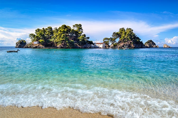 Photo of Panagia isle at Parga in Greece, Ionian sea and a sandy beach.