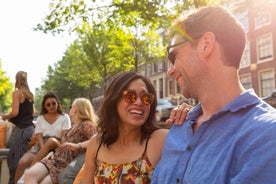 Amsterdam: Canal Cruise in German with Unlimited Drinks