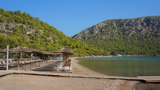 Photo of Heraion in Perachora with small beach, Loutraki, Greece.