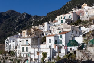 Photo of aerial morning view of Amalfi cityscape on coast line of Mediterranean sea, Italy.