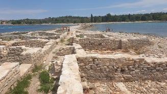 Photo of aerial view of town of Umag historic coastline architecture , archipelago of Istria region, Croatia.