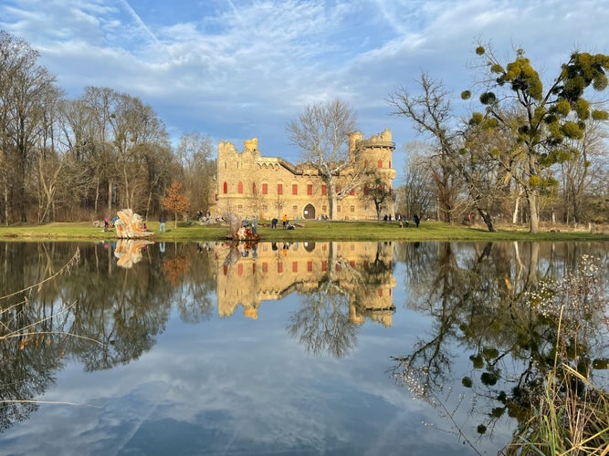  a ruin above river with reflection in water. Part of Lednice Valtice UNESCO area. Czech Republic, South Moravia region