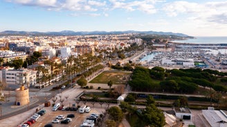 Photo of aerial view of beach and cityscape Salou, Spain.