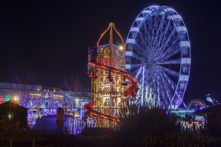 Photo of Bright lights of an Amusement Park in Swansea, Wales.