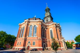 Photo of panorama of New City Hall in Hannover in a beautiful summer day, Germany.