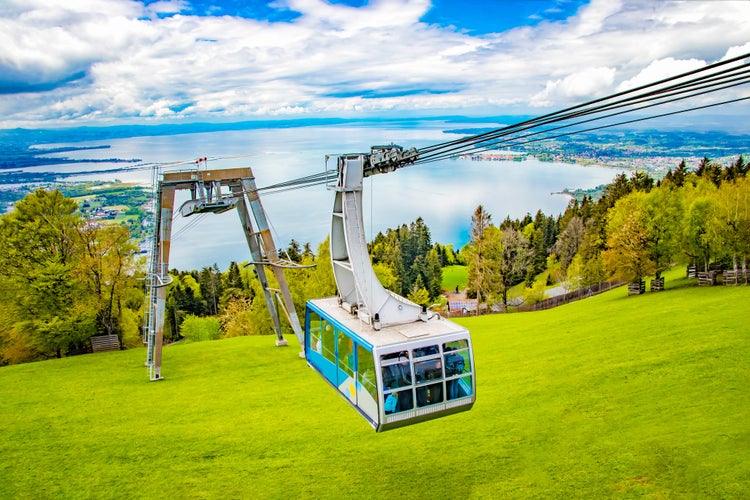 The Pfänder Cable car overlooking Lake Constance. Below is the Austrian town of Bregenz. With its views over the lake and the surrounding mountain peaks.