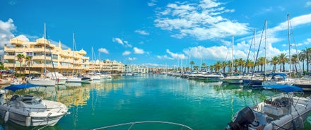 Photo of aerial panoramic view of Fuengirola city beach and marina, Fuengirola is a city on the Costa del Sol in the province of Malaga in the Andalusia, Spain.