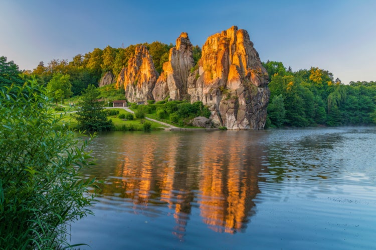 photo of Famous rock formation Externsteine in the Teutoburg Forest near Paderborn in the state of North Rhine-Westphalia in Germany.