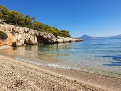 Photo of Heraion in Perachora with small beach, Loutraki, Greece.