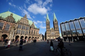 Photo of beautiful panoramic view of historic Bremen Market Square in the center of the Hanseatic City of Bremen with The Schuetting and famous Raths buildings on a sunny day with blue sky in summer, Germany.