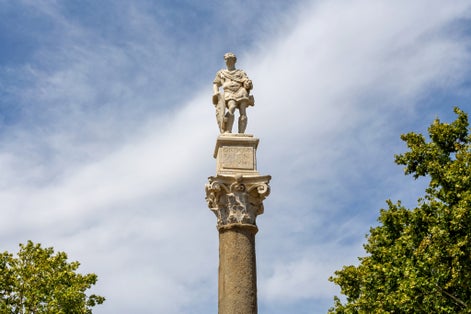 Photo of Statue Julius Caesar at Alameda de Hercules in Seville, Spain .