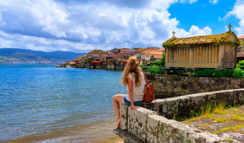 Photo of Woman tourist in Galicia, Combarro, Pontevedra in Spain.