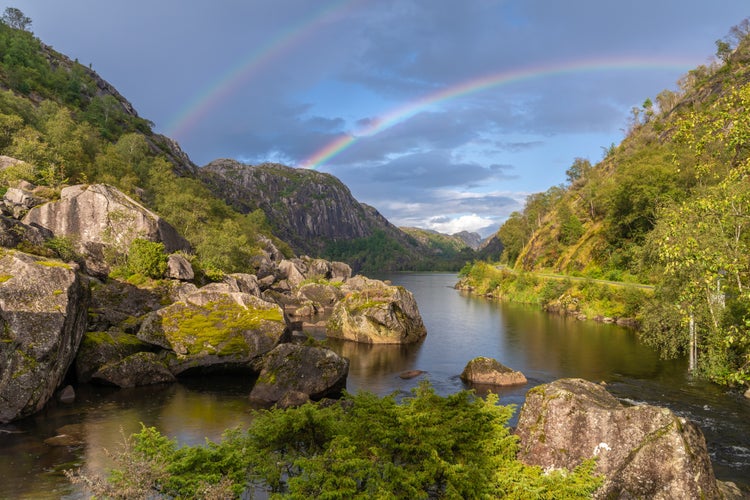 Photo of a beautiful double rainbow on the backroads of southern Norway, near Kristiansand.