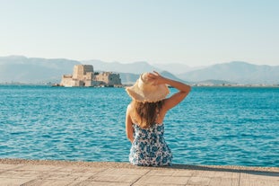 Photo of a small island with a fortress at the coast of Nafplio ,Greece.