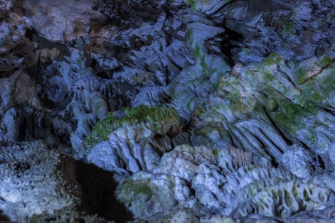 photo of  view of Bizarre, fantastic, strange shapes Nature has been forming for centuries: colourful stalagmite, stalactites, stalagnates, dendrites, rocks. Uhlovitsa cave, Rodopi mountain, Bulgaria,Uhlovitsa bulgaria.