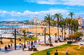 Photo of Sand beach and historical Old Town in mediterranean resort Sitges near Barcelona, Costa Dorada, Catalonia, Spain.