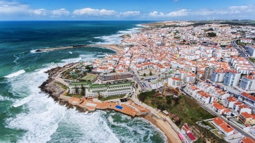 Photo of Baroque facade of Queluz National Palace and Neptune Fountain in Sintra, Lisbon district, Portugal.