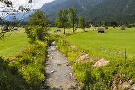 Photo of loisach river flowing through garmisch-partenkirchen, idyllic winter landscape bavaria.