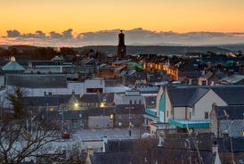 Photo of beautiful view of the old town city of Edinburgh from Calton Hill, United Kingdom.