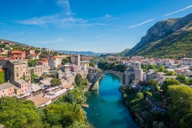 Photo of aerial view of the old bridge and river in city of Mostar, Bosnia and Herzegovina.