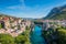 Photo of aerial view of the old bridge and river in city of Mostar, Bosnia and Herzegovina.