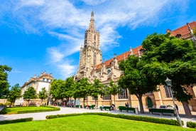 Panoramic view of historic Zurich city center with famous Fraumunster, Grossmunster and St. Peter and river Limmat at Lake Zurich on a sunny day with clouds in summer, Canton of Zurich, Switzerland