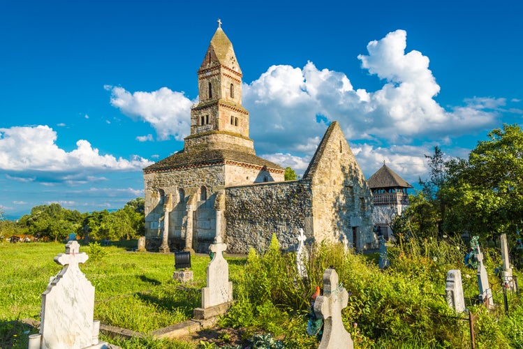 Photo of Densus Christian Church (Saint Nicholas' Church), Dacian and Roman temple, in Densus village, Hunedoara, Hateg, Romania.