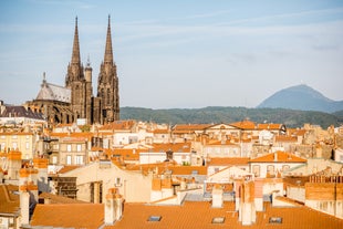 Photo of panoramic view of the city of Clermont-Ferrand with its cathedral, France.