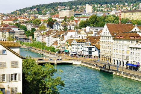 Photo of bridge at Limmatquai in the city center of Zurich, Switzerland. People on the background. Seen from Lindenhof hill.