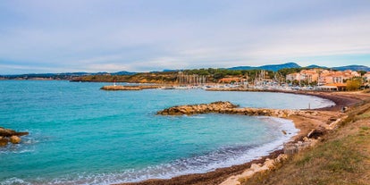 Photo of aerial view of the old town and St Paul church, Hyeres, France.