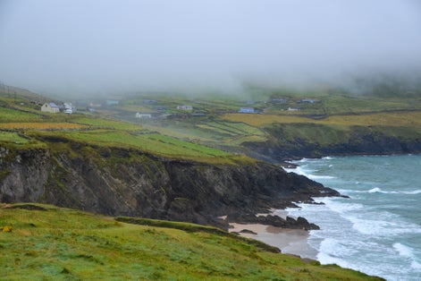 photo of A small village near the dramatic coastline and beach of Coumeenoole in Co Kerry Ireland