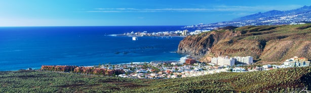 photo of aerial view of the beach and lagoon of Los Cristianos resort on Tenerife, Canary Islands, Spain.