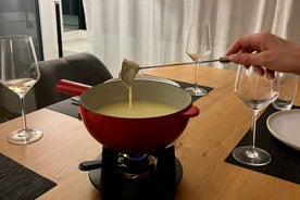 Zurich: Enjoy a cheese Fondue at home with locals