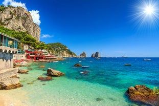 Photo of aerial view of Capri island in a beautiful summer day in Italy.