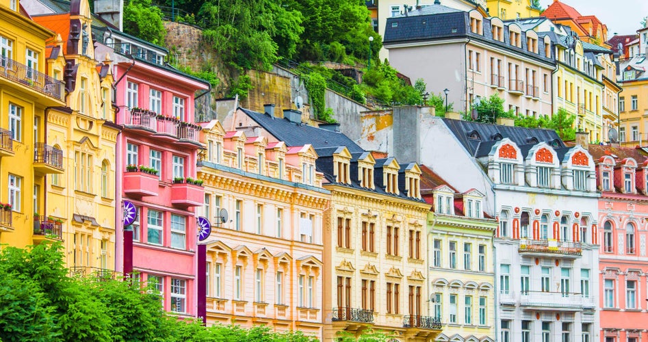 Colorful spa buildings in Karlovy Vary, a picturesque wellness retreat to visit in Czechia in July..jpg