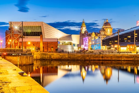 Photo of waterside of Liverpool dominated by the museum of Liverpool, England.