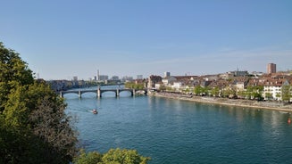 View of the Old Town of Basel with red stone Munster cathedral and the Rhine river, Switzerland.