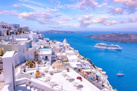 Photo of beautiful White architecture of Oia village on Santorini island, Greece.