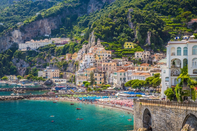 Photo of scenic picture-postcard view of the beautiful town of Amalfi at famous Amalfi Coast with Gulf of Salerno, Campania, Italy.