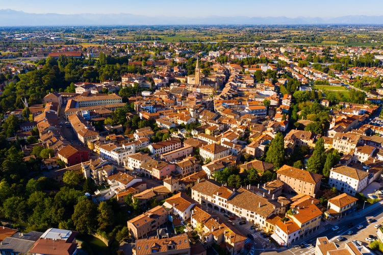 Photo of scenic cityscape from drone of Italian town of Portogruaro in sunny day, Veneto, Italy.