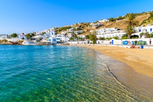 Photo of beautifull view over Mykonos from the sky with drone at the whitewashed village Greece.