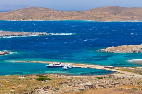 photo of view of Delos island near Mykonos, Greece.