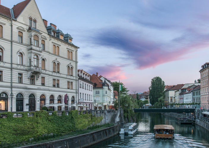 buildings-and-pedestrian-bridge-over-urban-canal-2023-11-27-04-59-00-utc.jpg